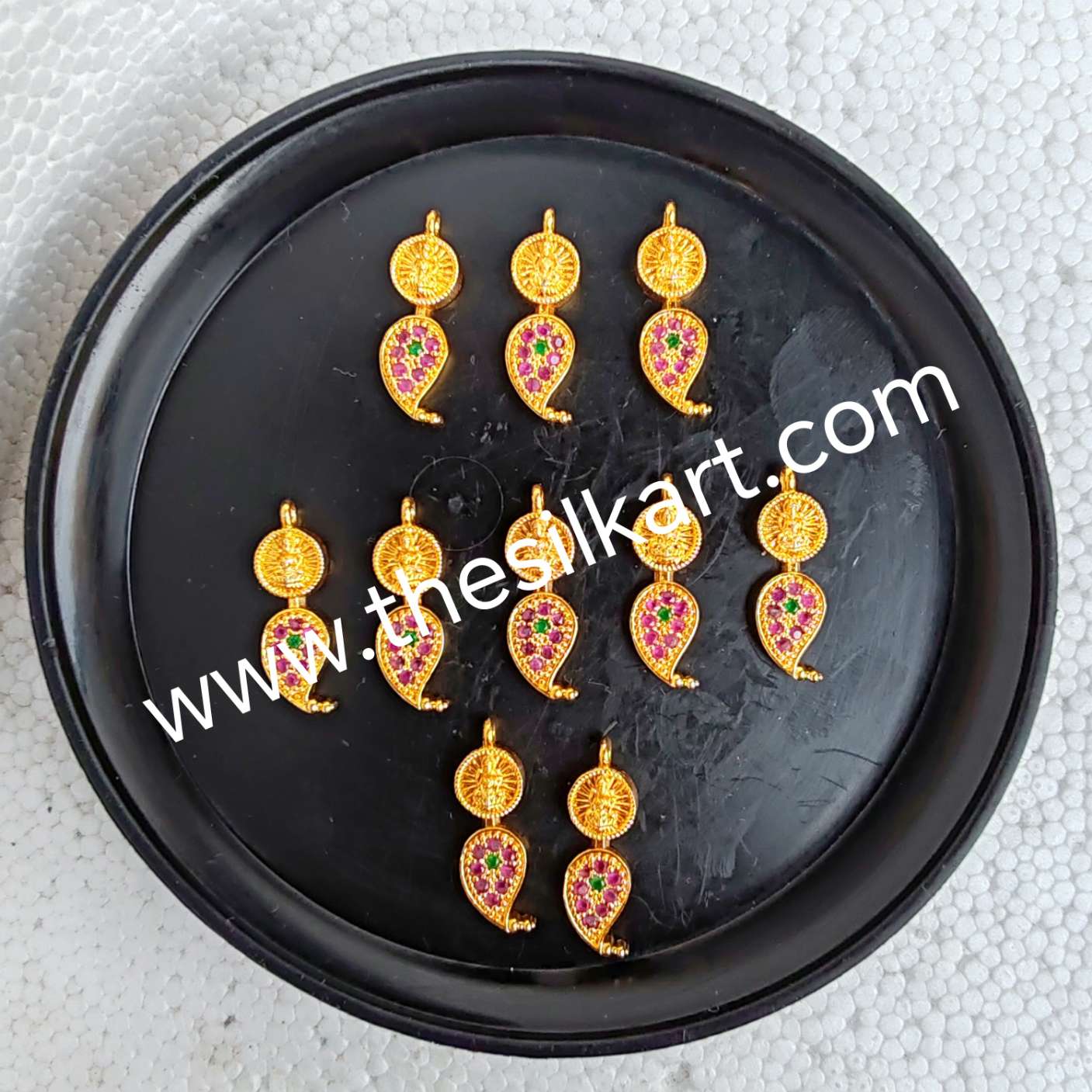 lakshmi with mango pendents